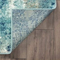 Detroit Abstract Aqua 8 ft. x 10 ft. Indoor Area Rug by Tayse Rugs -Malibu Wide Plank Shop aqua tayse rugs area rugs dtr1519 8x10 4f 1000
