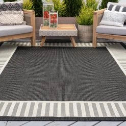 Eco Striped Border Black 5 ft. x 8 ft. Indoor/Outdoor Area Rug by Tayse Rugs -Malibu Wide Plank Shop black tayse rugs outdoor rugs eco1100 5x8 31 1000