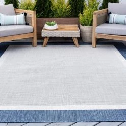 Eco Solid Border Blue 8 ft. x 10 ft. Indoor/Outdoor Area Rug by Tayse Rugs -Malibu Wide Plank Shop blue tayse rugs area rugs eco1202 8x10 31 1000