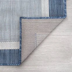 Eco Solid Border Blue 8 ft. x 10 ft. Indoor/Outdoor Area Rug by Tayse Rugs -Malibu Wide Plank Shop blue tayse rugs area rugs eco1202 8x10 4f 1000