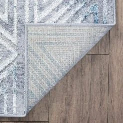 Grace Abstract Blue 9 ft. x 12 ft. Indoor Area Rug by Tayse Rugs -Malibu Wide Plank Shop blue tayse rugs area rugs grc1006 9x12 4f 1000