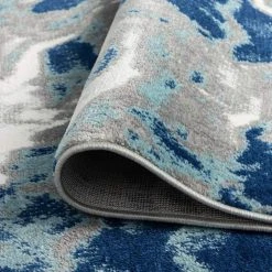 Timeless Abstract Blue 8 ft. x 10 ft. Indoor Area Rug by Tayse Rugs -Malibu Wide Plank Shop blue tayse rugs area rugs tml1106 8x10 1f 1000