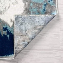 Timeless Abstract Blue 8 ft. x 10 ft. Indoor Area Rug by Tayse Rugs -Malibu Wide Plank Shop blue tayse rugs area rugs tml1106 8x10 4f 1000