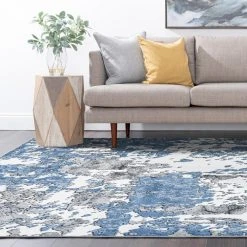 Wyatt Abstract Blue 9 ft. x 12 ft. Indoor Area Rug by Tayse Rugs 15 Wyatt Abstract Blue 9 ft. x 12 ft. Indoor Area Rug by Tayse Rugs -Malibu Wide Plank Shop blue tayse rugs area rugs wyt1006 9x12 44 1000