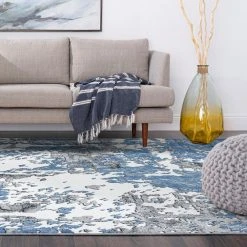 Wyatt Abstract Blue 9 ft. x 12 ft. Indoor Area Rug by Tayse Rugs 16 Wyatt Abstract Blue 9 ft. x 12 ft. Indoor Area Rug by Tayse Rugs -Malibu Wide Plank Shop blue tayse rugs area rugs wyt1006 9x12 fa 1000