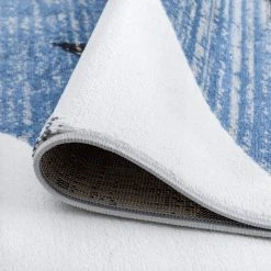 Wyatt Abstract Blue 9 ft. x 12 ft. Indoor Area Rug by Tayse Rugs -Malibu Wide Plank Shop blue tayse rugs area rugs wyt1206 9x12 1f 1000