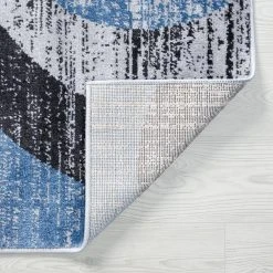 Wyatt Abstract Blue 9 ft. x 12 ft. Indoor Area Rug by Tayse Rugs -Malibu Wide Plank Shop blue tayse rugs area rugs wyt1206 9x12 4f 1000