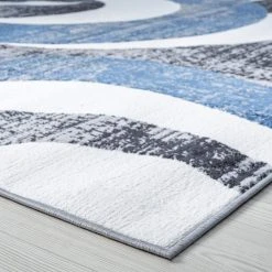 Wyatt Abstract Blue 9 ft. x 12 ft. Indoor Area Rug by Tayse Rugs -Malibu Wide Plank Shop blue tayse rugs area rugs wyt1206 9x12 c3 1000
