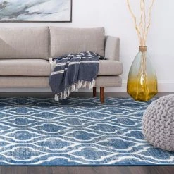 Wyatt Geometric Blue 9 ft. x 12 ft. Indoor Area Rug by Tayse Rugs 16 Wyatt Geometric Blue 9 ft. x 12 ft. Indoor Area Rug by Tayse Rugs -Malibu Wide Plank Shop blue tayse rugs area rugs wyt1706 9x12 fa 1000