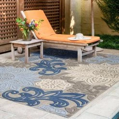 Oasis Floral Blue 8 ft. x 10 ft. Indoor/Outdoor Area Rug by Tayse Rugs -Malibu Wide Plank Shop blue tayse rugs outdoor rugs oas1306 8x10 31 1000