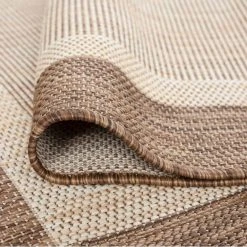 Eco Solid Border Brown 5 ft. x 8 ft. Indoor/Outdoor Area Rug by Tayse Rugs -Malibu Wide Plank Shop brown tayse rugs outdoor rugs eco1203 5x8 1f 1000