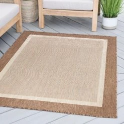 Eco Solid Border Brown 5 ft. x 8 ft. Indoor/Outdoor Area Rug by Tayse Rugs -Malibu Wide Plank Shop brown tayse rugs outdoor rugs eco1203 5x8 44 1000