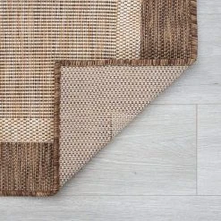 Eco Solid Border Brown 5 ft. x 8 ft. Indoor/Outdoor Area Rug by Tayse Rugs -Malibu Wide Plank Shop brown tayse rugs outdoor rugs eco1203 5x8 4f 1000