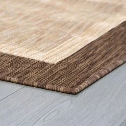 Eco Solid Border Brown 5 ft. x 8 ft. Indoor/Outdoor Area Rug by Tayse Rugs -Malibu Wide Plank Shop brown tayse rugs outdoor rugs eco1203 5x8 c3 1000