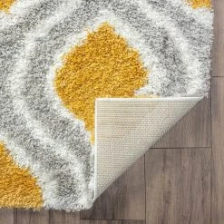 Uptown Shag Geometric Gold 8 ft. x 10 ft. Indoor Area Rug by Tayse Rugs -Malibu Wide Plank Shop gold tayse rugs area rugs upt1010 8x10 4f 1000