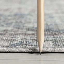 Parker Oriental Navy 5 ft. x 7 ft. Machine Washable Indoor Area Rug by Tayse Rugs -Malibu Wide Plank Shop navy tayse rugs area rugs prk1507 5x7 e1 1000