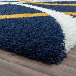 Uptown Shag Abstract Navy 9 ft. x 12 ft. Indoor Area Rug by Tayse Rugs 12 Uptown Shag Abstract Navy 9 ft. x 12 ft. Indoor Area Rug by Tayse Rugs -Malibu Wide Plank Shop navy tayse rugs area rugs upt1160 9x12 4f 1000