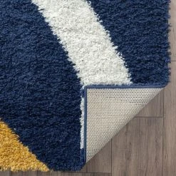 Uptown Shag Abstract Navy 9 ft. x 12 ft. Indoor Area Rug by Tayse Rugs 10 Uptown Shag Abstract Navy 9 ft. x 12 ft. Indoor Area Rug by Tayse Rugs -Malibu Wide Plank Shop navy tayse rugs area rugs upt1160 9x12 66 1000