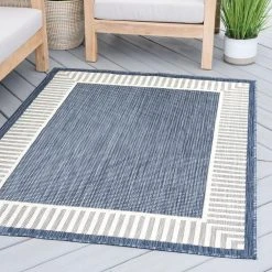 Eco Striped Border Navy 8 ft. x 10 ft. Indoor/Outdoor Area Rug by Tayse Rugs -Malibu Wide Plank Shop navy tayse rugs outdoor rugs eco1105 8x10 44 1000