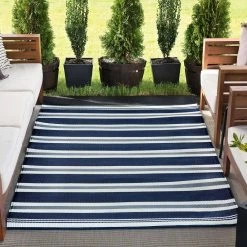 Sunset Stripe Navy 9 ft. x 12 ft. Indoor/Outdoor Area Rug by Tayse Rugs 9 Sunset Stripe Navy 9 ft. x 12 ft. Indoor/Outdoor Area Rug by Tayse Rugs -Malibu Wide Plank Shop navy tayse rugs outdoor rugs sun1302 9x12 31 1000