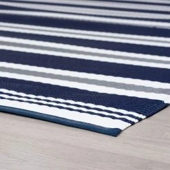 Sunset Stripe Navy 9 ft. x 12 ft. Indoor/Outdoor Area Rug by Tayse Rugs 8 Sunset Stripe Navy 9 ft. x 12 ft. Indoor/Outdoor Area Rug by Tayse Rugs -Malibu Wide Plank Shop navy tayse rugs outdoor rugs sun1302 9x12 4f 1000