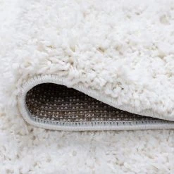 Jersey Shag Solid White 9 ft. x 12 ft. Indoor Area Rug by Tayse Rugs -Malibu Wide Plank Shop white tayse rugs area rugs jrs1000 9x12 1f 1000