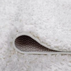 Soho Shag Solid Color White 5 ft. x 7 ft. Indoor Area Rug by Tayse Rugs 14 Soho Shag Solid Color White 5 ft. x 7 ft. Indoor Area Rug by Tayse Rugs -Malibu Wide Plank Shop white tayse rugs area rugs soh1300 5x7 44 1000