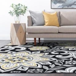Wyatt Floral Yellow 9 ft. x 12 ft. Indoor Area Rug by Tayse Rugs -Malibu Wide Plank Shop yellow tayse rugs area rugs wyt1311 9x12 44 1000
